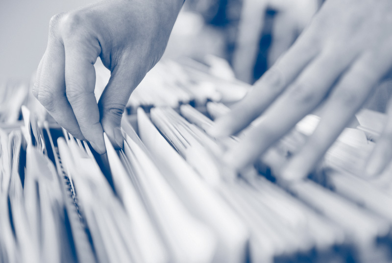 papers in a filing cabinet